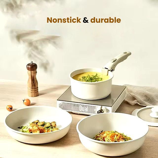 4-piece nonstick pan set for cooking and placing on the warmer, with a removable handle